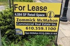 Modern Ardmore Realtor Signs in Grass