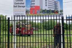 Raised Philadelphia Realtor Signs Behind Fence